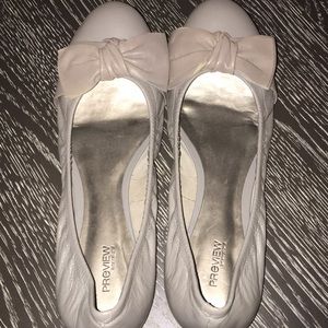 Grey flats with a bow